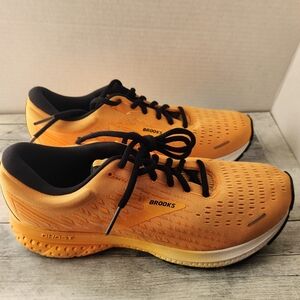 Brooks Ghost size 9 orange running shoes.